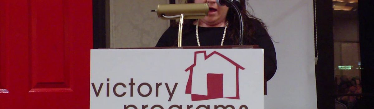 woman speaking on mic